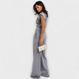 Michaela - Asymmetrische set met dramatische schouders