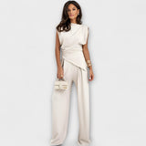 Michaela - Asymmetrische set met dramatische schouders