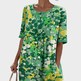 Elena - Losse en lichte midi-jurk met bloemen