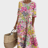 Elena - Losse en lichte midi-jurk met bloemen