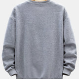 Albert | Sweater met geometrisch streepjacquard en relaxte pasvorm