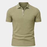 Alexander | Blauwe polo met contrastbies