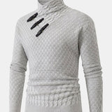 Guus | Gebreide jacquard coltrui met leren gespdetails