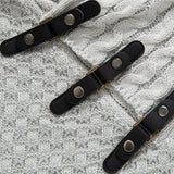 Guus | Gebreide jacquard coltrui met leren gespdetails