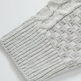Guus | Gebreide jacquard coltrui met leren gespdetails