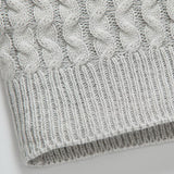 Guus | Gebreide jacquard coltrui met leren gespdetails