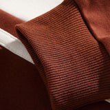Jan | Polosweater met patchworkdetails en kleurvlakken en relaxte pasvorm