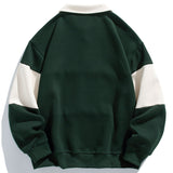 Jan | Polosweater met patchworkdetails en kleurvlakken en relaxte pasvorm