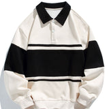 Jan | Polosweater met patchworkdetails en kleurvlakken en relaxte pasvorm