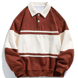 Jan | Polosweater met patchworkdetails en kleurvlakken en relaxte pasvorm