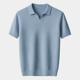Jonas | Marineblauwe polo met open kraag