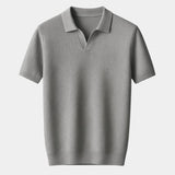 Jonas | Marineblauwe polo met open kraag