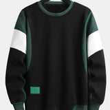 Levi | Sweater met patchworkdetails en kleurvlakken