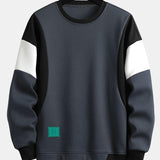 Levi | Sweater met patchworkdetails en kleurvlakken