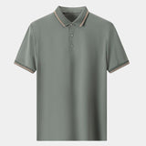 Melchior | Marineblauwe polo met contrastbies