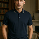 Melchior | Marineblauwe polo met contrastbies