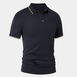 Melchior | Marineblauwe polo met contrastbies
