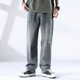 Nout | Verwassen jeans met scheurdetails en rechte pijpen