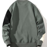 Pieter | Sweater met patchworkdetails en kleurvlakken