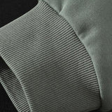 Pieter | Sweater met patchworkdetails en kleurvlakken