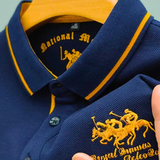 Rogier | Marineblauwe polo met clubstrepen