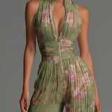 Amelia – groene geplooide jumpsuit met bloemen