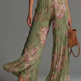 Amelia – groene geplooide jumpsuit met bloemen
