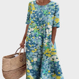 Elena - Losse en lichte midi-jurk met bloemen