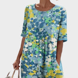 Elena - Losse en lichte midi-jurk met bloemen