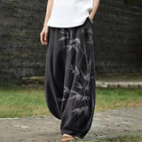 Anaïs – Brede zwarte broek met bamboepatroon