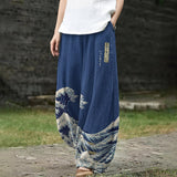 Ariane – Brede, marineblauwe broek met golvenpatroon
