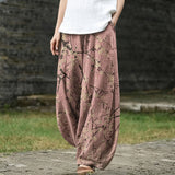 Fabienne – Brede broek met roze bladerenpatroon