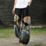 Joséphine – Zwarte brede broek met grafisch patroon