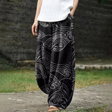 Clémence – Brede zwarte gedrukte broek