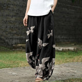 Françoise – Zwarte brede broek met crane patroon