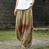 Madeleine – Beige brede broek met subtiel patroon
