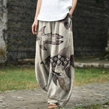 Hélène – Beige brede broek met vispatroon