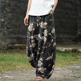 Ghislaine – Zwarte brede broek met vogelmotief
