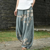 Iseult – Brede broek met lichtblauw bladerenpatroon