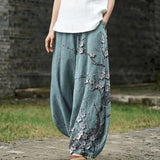 Carine – Brede broek met blauw bladerenpatroon