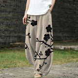 Céleste – Beige, brede broek met bloemenpatroon